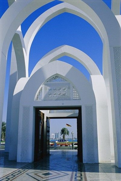 The Doha Corniche seen through an arch