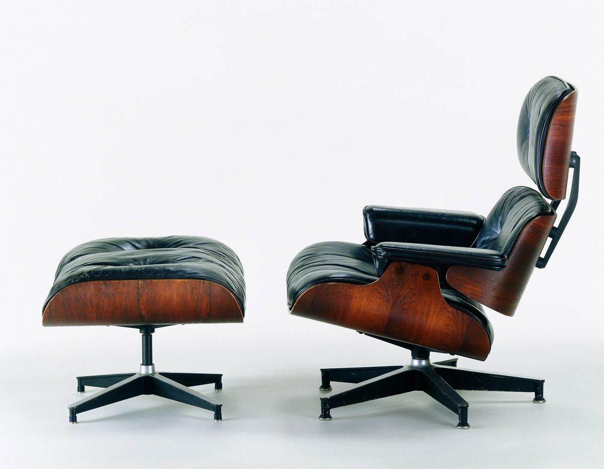 A leather lounge chair with ottoman